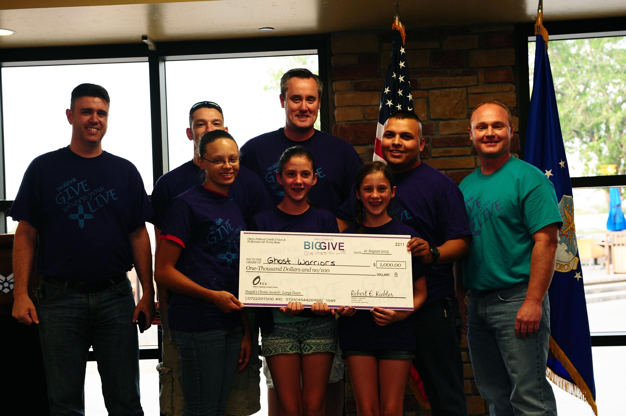 Members from Team Ghost Warriors receive the Large Team People’s Choice Award of $1,000 at the Big Give after party on Aug 21.This year’s Big Give consisted of 540 volunteers in 40 teams working a total of 7,292 hours and saving the community $458,431.98. 