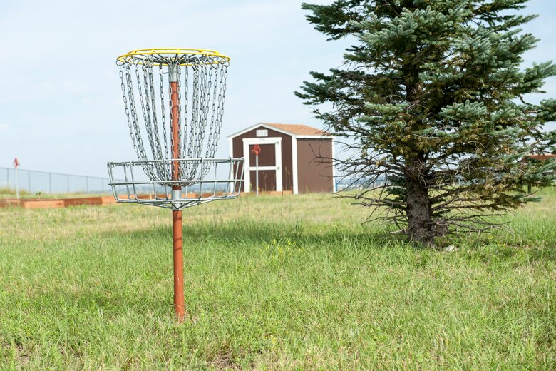 PETERSON AIR FORCE BASE, Colo. – One of the many amenities available at Peak View Park includes a Frisbee golf course. Equipment is available for use free of charge from 10 a.m.–6 p.m. Monday through Friday and noon-6 p.m. Saturdays. The park also offers sand volleyball, horseshoes, a playground, and a pavilion with gas grills, and 20 garden plots. (U.S. Air Force photo by Airman 1st Class Rose Gudex)