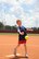 Noah Kunkel, son of U.S. Air Force Col. Thomas Kunkel, 23d Wing commander, throws the first pitch at the Lowndes High School Vikettes Military Appreciation softball game at Morris-Coats Field of Dreams, Valdosta, Ga., Aug. 22, 2015. This was one of the first community events that allowed the Kunkel family to interact with local members of the community. (U.S. Air Force photo by Andrea Jenkins/Released).