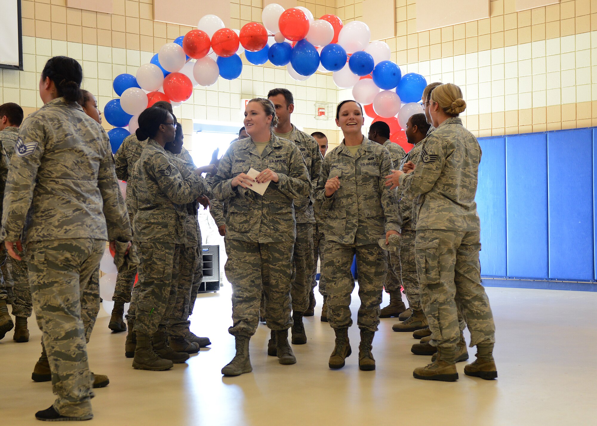U.S. Air Force non-commissioned officers congratulate senior airmen who made staff sergeant during the Staff Sergeant Release party at Langley Air Force Base, Va., Aug. 20, 2015.The selection rate for staff sergeant a rate of was 33.8 percent. (U.S. Air Force photo by Staff Sgt. John D. Strong II/ Released)