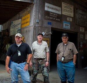 (left to right) Keith Thompson, 628th Civil Engineer Squadron conservation program manager, Terrance Larimer, 628th CES natural resources manager and Roger Sparwasser, 628th CES forester pose for a group photo Aug. 24, 2015, at the natural resources office on Joint Base Charleston, S.C. These men are responsible for managing JB Charleston’s natural resources by conserving and protecting them. They recently won the General Thomas D. White Natural Resources Award for the large installation category, Air Mobility Command. The purpose of the General Thomas D. White award competition is to promote excellence in every aspect of Air Force environmental programs. The competition is designed to recognize the efforts of installations and individuals for environmental quality, restoration, pollution prevention, recycling and conversation of natural and cultural resources. (U.S. Air Force photo/Airman 1st Class Clayton Cupit)