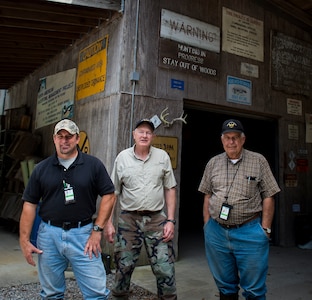 (left to right) Keith Thompson, 628th Civil Engineer Squadron conservation program manager, Terrance Larimer, 628th CES natural resources manager and Roger Sparwasser, 628th CES forester pose for a group photo Aug. 24, 2015, at the natural resources office on Joint Base Charleston, S.C. These men are responsible for managing JB Charleston’s natural resources by conserving and protecting them. They recently won the General Thomas D. White Natural Resources Award for the large installation category, Air Mobility Command. The purpose of the General Thomas D. White award competition is to promote excellence in every aspect of Air Force environmental programs. The competition is designed to recognize the efforts of installations and individuals for environmental quality, restoration, pollution prevention, recycling and conversation of natural and cultural resources. (U.S. Air Force photo/Airman 1st Class Clayton Cupit)
