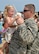 An Airman is greeted by a child upon returning from a six-month deployment to Andersen Air Force Base, Guam, at Barksdale Air Force Base, La., Aug. 24, 2015. The U.S. conducts CBP operations as part of a routine, forward-deployed, global strike capability supporting regional security and our allies in the Indo-Asia-Pacific region. (U.S. Air Force photo/Airman 1st Class Mozer O. Da Cunha)