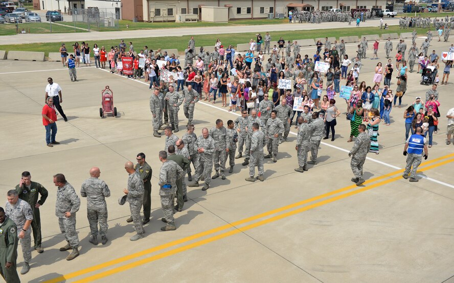 Families wait for loved ones to return from their deployment to Guam, at Barksdale Air Force Base, La., Aug. 24, 2015. Members of the 20th Bomb Squadron and the 2nd Maintenance Group were deployed in support of the continuous bomber presence in the Pacific region. (U.S. Air Force photo/Airman 1st Class Mozer O. Da Cunha)