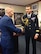 Lt. Gen. Steven Kwast, Air University commander, speaks with members of the French Air Force at Air University at Maxwell Air Force Base, Aug. 21, 2015. Col. Géraud Laborie, French Air Attaché to the United States, presented the French Legion of Honor medal to Kwast for his service as the deputy director for Politico-Military Affairs for Europe, NATO, and Russia, Strategic Plans and Policy Directorate, Joint Staff, the Pentagon, Washington, D.C.  The award is an order of distinction first established by Napoleon Bonaparte in May of 1802. It is the highest decoration bestowed in France and is divided into five categories: Knight, Officer, Commander, Grand Officer and Grand Cross. Kwast was declared a Chevalier (Knight) and vowed to earn the honor as long as he serves his country. The highest degree of the Order of the Legion of Honor is that of Grand Master, which is held by the sitting President of the Republic.