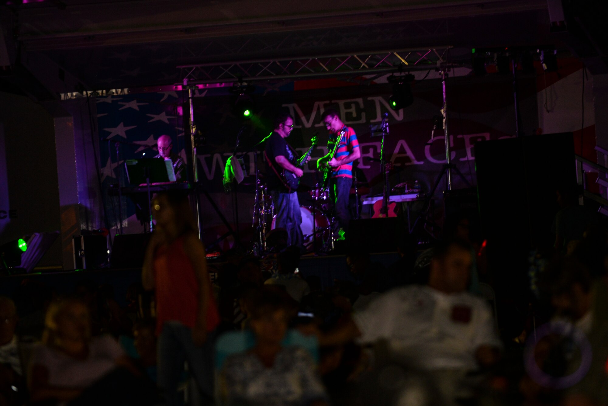 The band “Men with Faces” plays music for the crowd during the Independence Day Celebration and Back to School Bash, Aug. 21, 2015, at Seymour Johnson Air Force Base, North Carolina. The bash featured multiple food vendors and boutiques and ended with fireworks at the end of the night. (U.S. Air Force photo/Airman 1st Class Ashley Williamson)