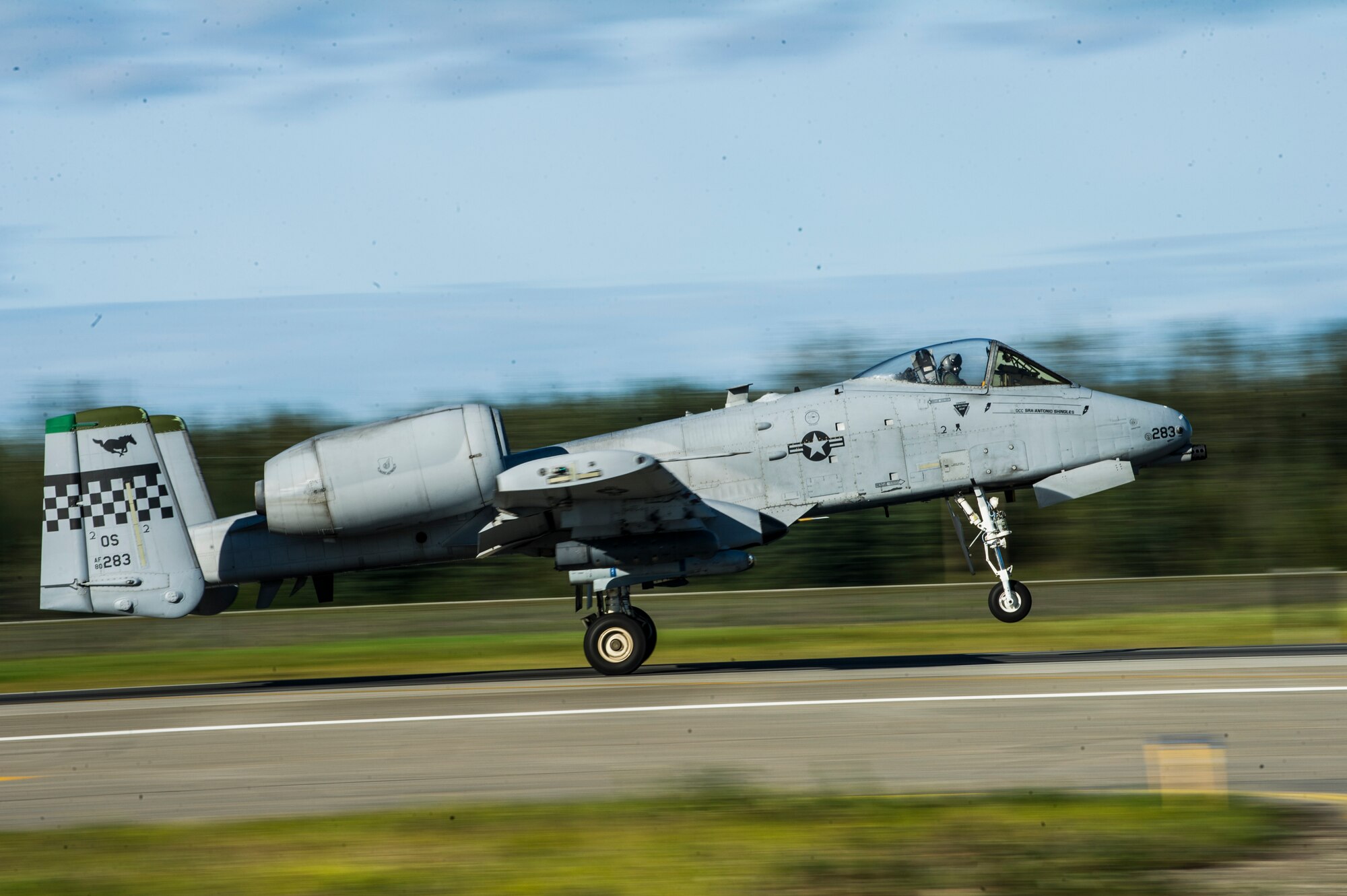 A U.S. Air Force A-10 Thunderbolt II aircraft assigned to the 25th Fighter Squadron from Osan Air Base, Republic of Korea, takes off from Eielson Air Force Base, Alaska, Aug. 21, 2015, during RED FLAG-Alaska (RF-A) 15-3. RF-A is a series of Pacific Air Forces commander-directed field training exercise for U.S. and partner nation forces, providing combined offensive counter-air, interdiction, close air support and large force employment training in a simulated combat environment. (U.S. Air Force photo by Staff Sgt. Joshua Turner/Released)