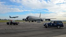 U.S. Air Force Security Forces Airmen surround a simulated hijacked KC-135 Stratotanker during an exercise Aug. 24, 2015, on RAF Mildenhall, England. Emergency responders established a cordon around the aircraft to secure the area. (U.S. Air Force photo by Staff Sgt. Micaiah Anthony/Released)