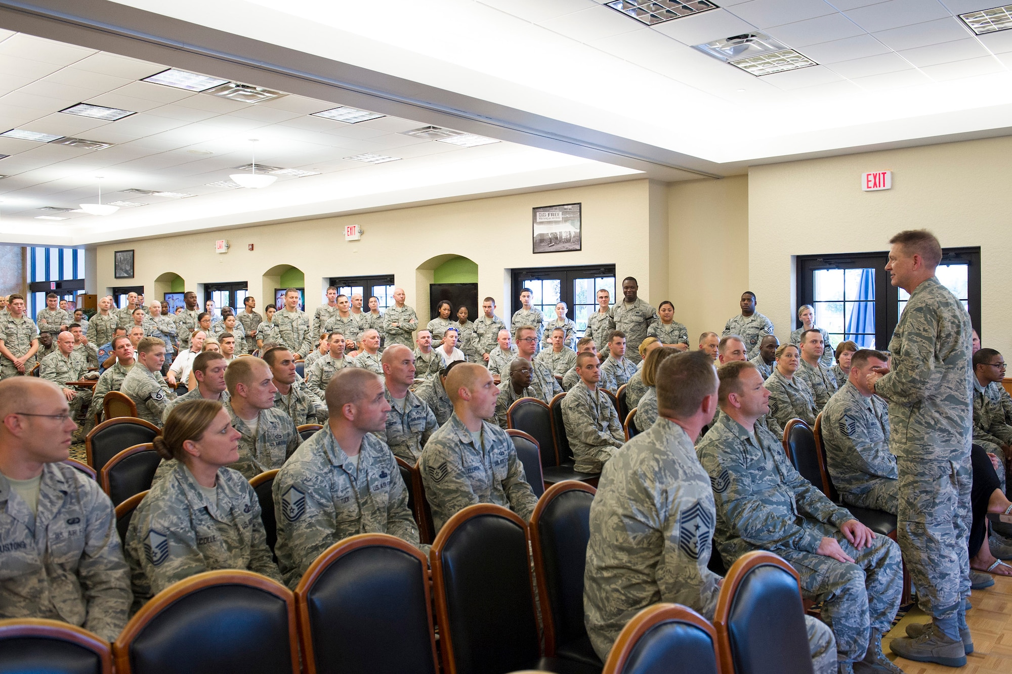 Brig. Gen. Wayne Monteith, 45th Space Wing commander, addresses 75 newly selected staff sergeants of Team Patrick-Cape during a promotion release celebration Aug. 20, 2015, at the Patrick Air Force Base Golf Course, Fla. Air Force officials selected 13,269 of 39,260 eligible senior airmen for promotion to staff sergeant for a selection rate of 33.8 percent. (U.S. Air Force photo by Matthew Jurgens/Released)