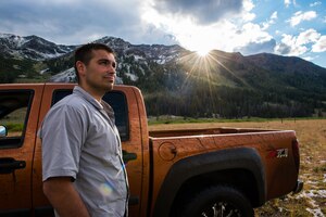 Senior Airman Jaye Legate poses for a photo after fording several streams with his truck in the Salmon-Challis National Forest, Idaho July 15, 2015. The Salmon-Challis is one of many national forests surrounding Sun Valley. (U.S. Air Force photo by Airman 1st Class Connor J. Marth)
