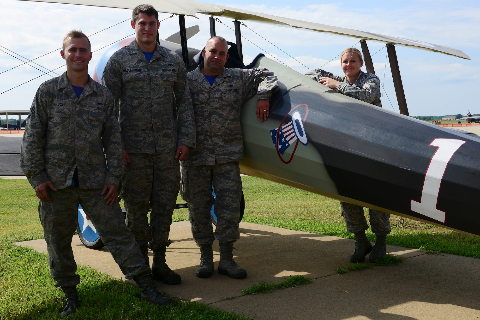 U.S. Air Force Airmen from the 94th Fighter Squadron and Aircraft Maintenance Unit pose for a photo at Langley Air Force Base, Va., Aug. 21, 2015. The photo was taken in honor of the 94th FS’s 98th birthday. (U.S. Air Force photo by Staff Sgt. Ciara Gosier/Released)