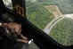 X, a military working dog, rides in a UH-1N Twin Huey helicopter over the National Capital Region, Aug. 19, 2015. Pilots from the 1st Helicopter Squadron flew the mission to get X better acclimated to helicopter noise and vibration. (U.S. Air Force photo/ Airman 1st Class J.D. Maidens)