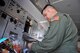 Tech. Sgt. Todd Dallman, 76th Air Refueling Squadron boom operator, prepares a meal during an eight-hour flight from Germany inside a KC-10 Extender Aug. 2. The KC-10 have two small convection ovens. (U.S. Air Force photo by Lt. Col. Kimberly Lalley)