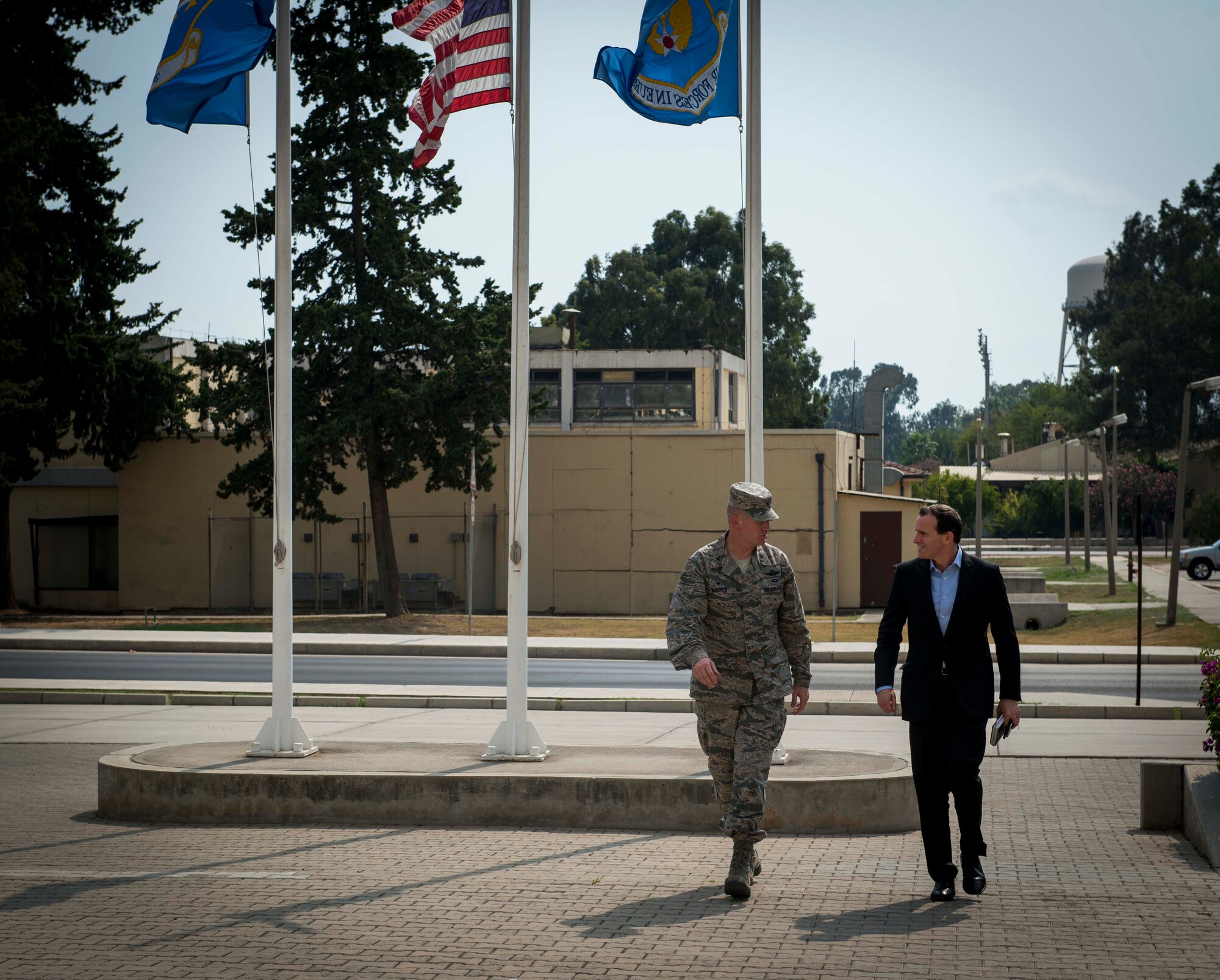 Col. John Walker, 39th Air Base Wing commander, speaks with Brett H. McGurk, U.S. Ambassador, Deputy Special Presidential Envoy to the Global Coalition to Counter ISIL, as he arrives for a base visit Aug. 14, 2015, at Incirlik Air Base, Turkey.  McGurk toured the base to get a hands-on look at the base’s capabilities and learn more about the 39th ABW’s mission. (U.S. Air Force photo by Airman 1st Class Cory W. Bush/Released)