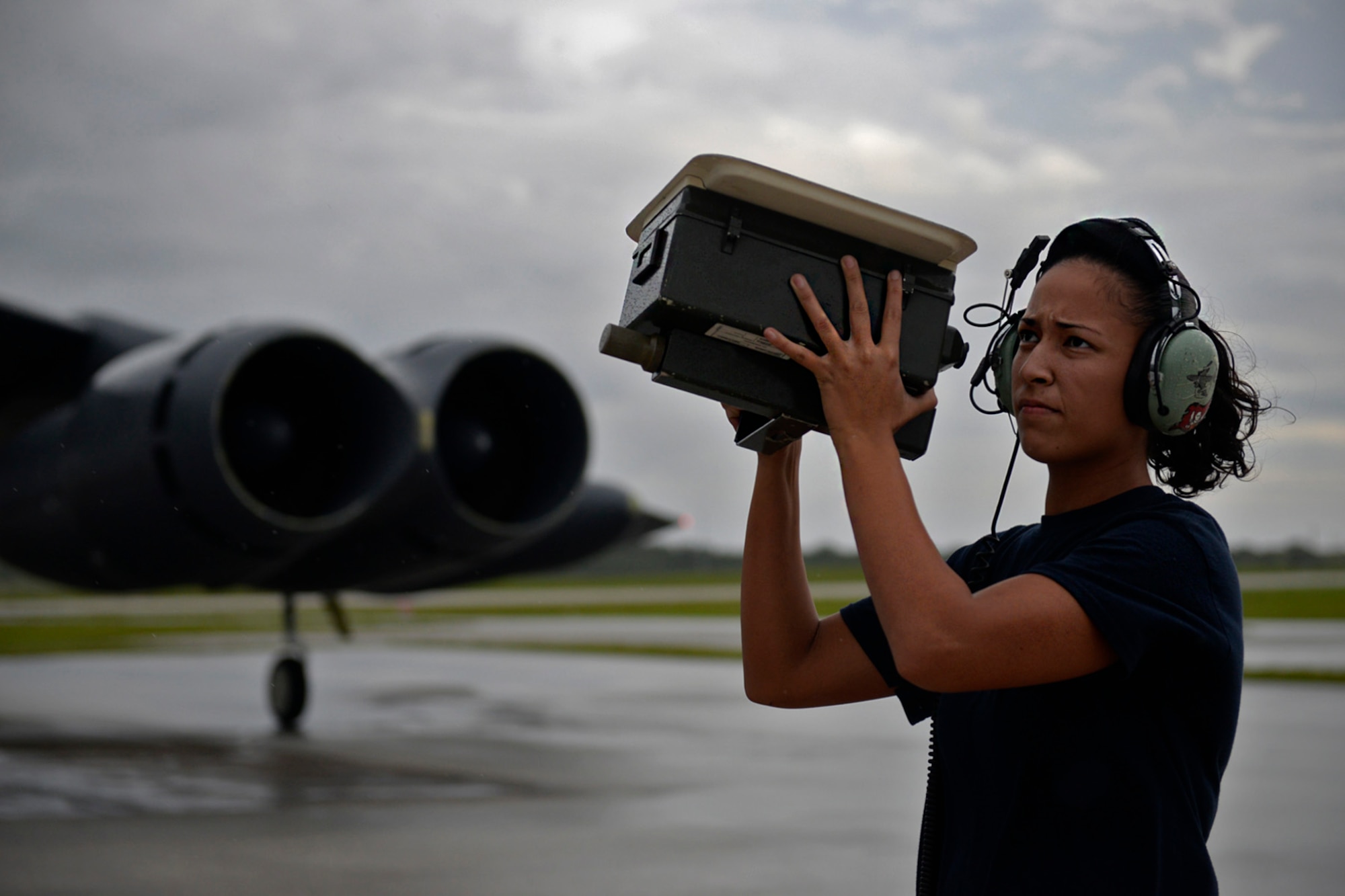 Senior Airman Alexandra Washington, communications and navigations technician assigned to the 20th Expeditionary Aircraft Maintenance Squadron, checks antennae signals on a B-52 Stratofortress before flight Aug. 22, 2015, at Andersen Air Force Base, Guam. Bomber crews with the 20th Expeditionary Bomb Squadron are part of U.S. Pacific Command’s continuous bomber presence and support ongoing operations in the Indo-Asia-Pacific region. (U.S. Air Force photo by Staff Sgt. Alexander W. Riedel/Released)