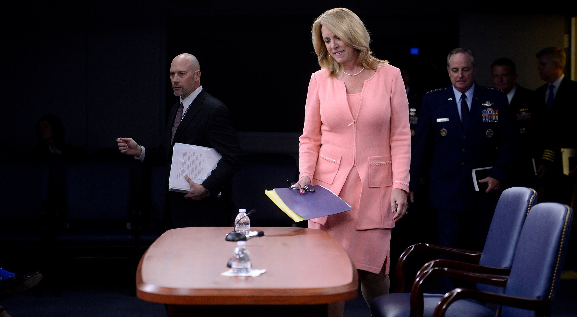Secretary of the Air Force Deborah Lee James and Air Force Chief of Staff Gen. Mark A. Welsh III enter the press briefing room in the Pentagon before providing the media an update on current Air Force operations, Aug. 24, 2015. (U.S. Air Force photo/Scott M. Ash) 