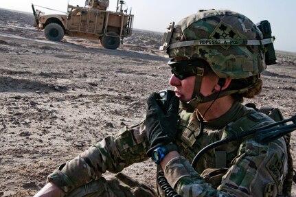 U.S. Army 1st Lt. Elyse Ping Medvigy conducts a call-for-fire during an artillery shoot south of Kandahar Airfield, Afghanistan, Aug. 22, 2014. Medvigy, a fire support officer assigned to the 4th Infantry Division's Company D, 1st Battalion, 12th Infantry Regiment, 4th Infantry Brigade Combat Team, is the first female company fire support officer to serve in an infantry brigade combat team supporting Operation Enduring Freedom. U.S. Army photo by Staff Sgt. Whitney Houston