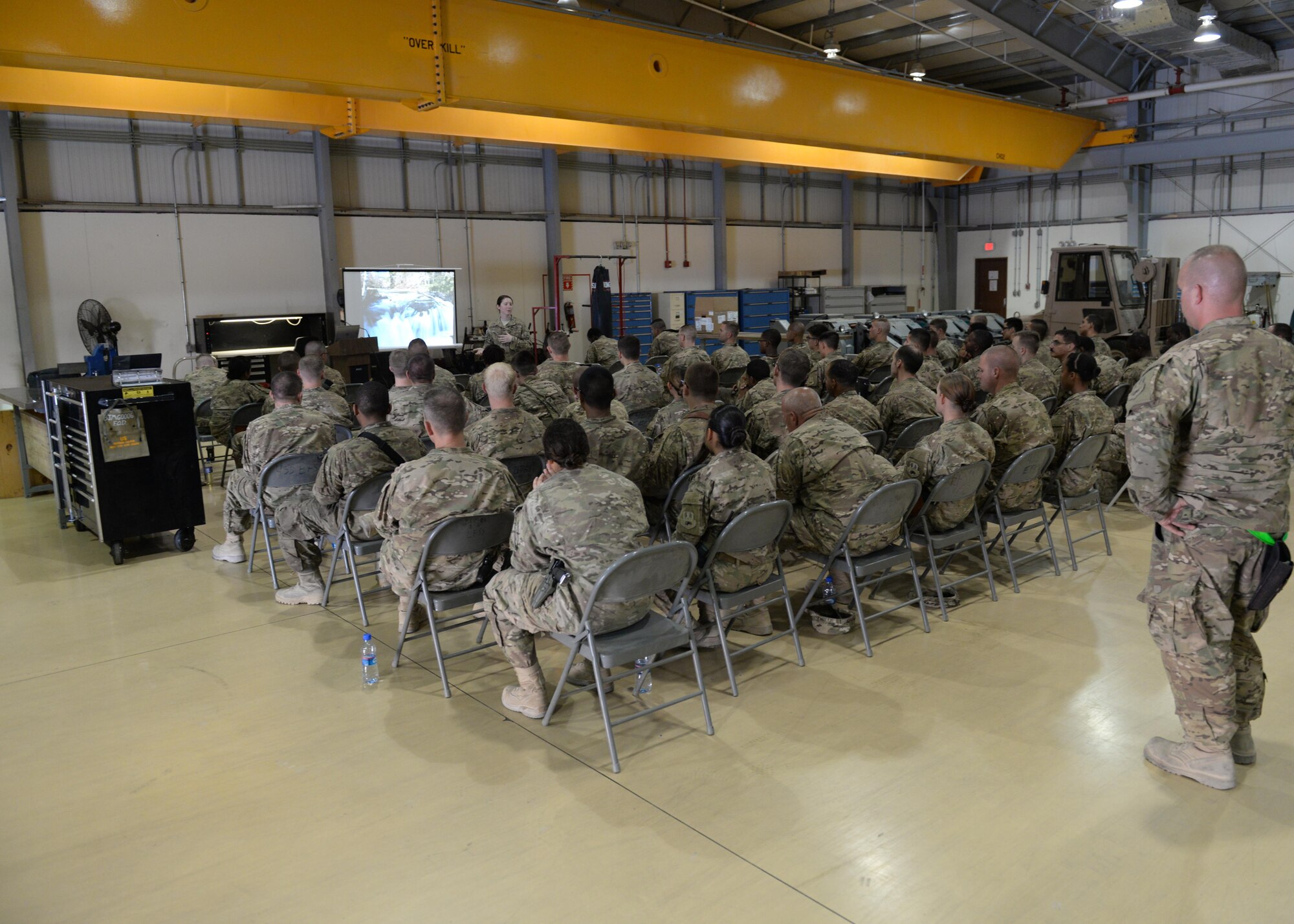 U.S. Air Force Capt. Diana Hall, 455th Air Expeditionary Wing sexual assault response coordinator, gives a sexual assault prevention and response briefing to Airmen Aug. 25, 2015 at Bagram Airfield, Afghanistan. The SAPR briefing is mandatory for all Airmen and teaches how to prevent sexual assault and how to handle and respond to a situation. (U.S. Air Force photo by Senior Airman Cierra Presentado/Released)