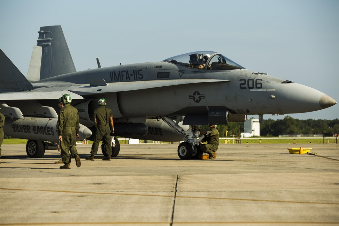 Marines prepare an F/A-18C Hornet to take off from Marine Corps Air Station Beaufort, S.C. to participate in Sentry Savannah, Aug 21. The hornet flew a joint mission with the Air Force simulating enemy aircraft in a large force exercise for the Marines are with Marine Fighter Attack Squadron 115, Marine Aircraft Group 31. 