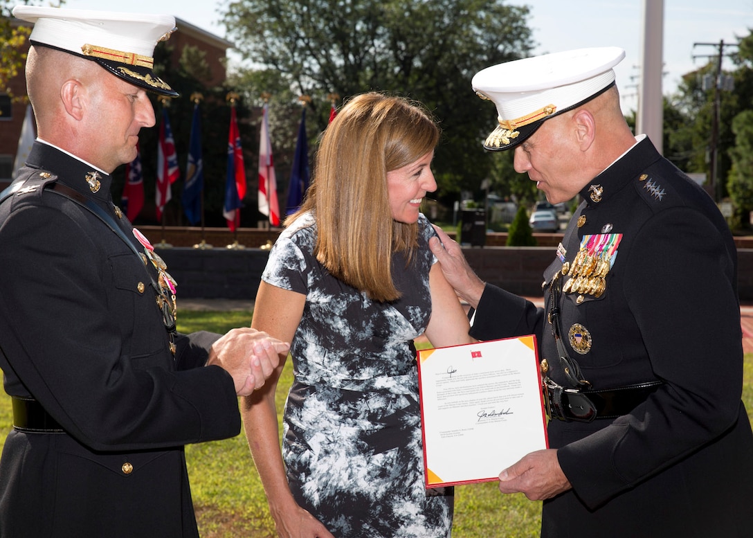 The Assistant Commandant of the U.S. Marine Corps, Gen. John M. Paxton, Jr., right, officiates the retirement ceremony in honor of Col. John M. Reed on Joint Base Myer-Henderson Hall, Aug. 25, 2015. (U.S. Marine Corps photo by Sgt. Tia Dufour/Released)
