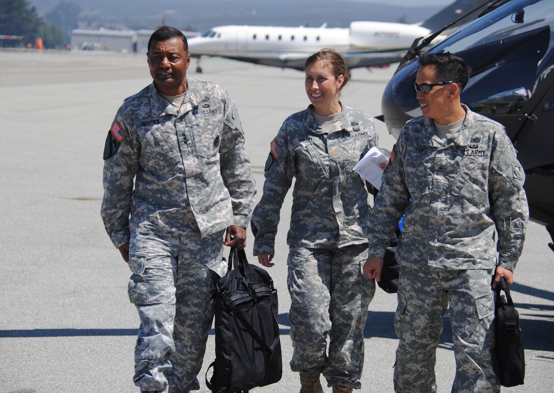 LTG Thomas P. Bostick, commanding general and chief of engineers, USACE, MAJ Lisa Mann, aide de camp to Gen. Bostick and BG Mark Toy, commander USACE South Pacific Division arrives Monterey airport.