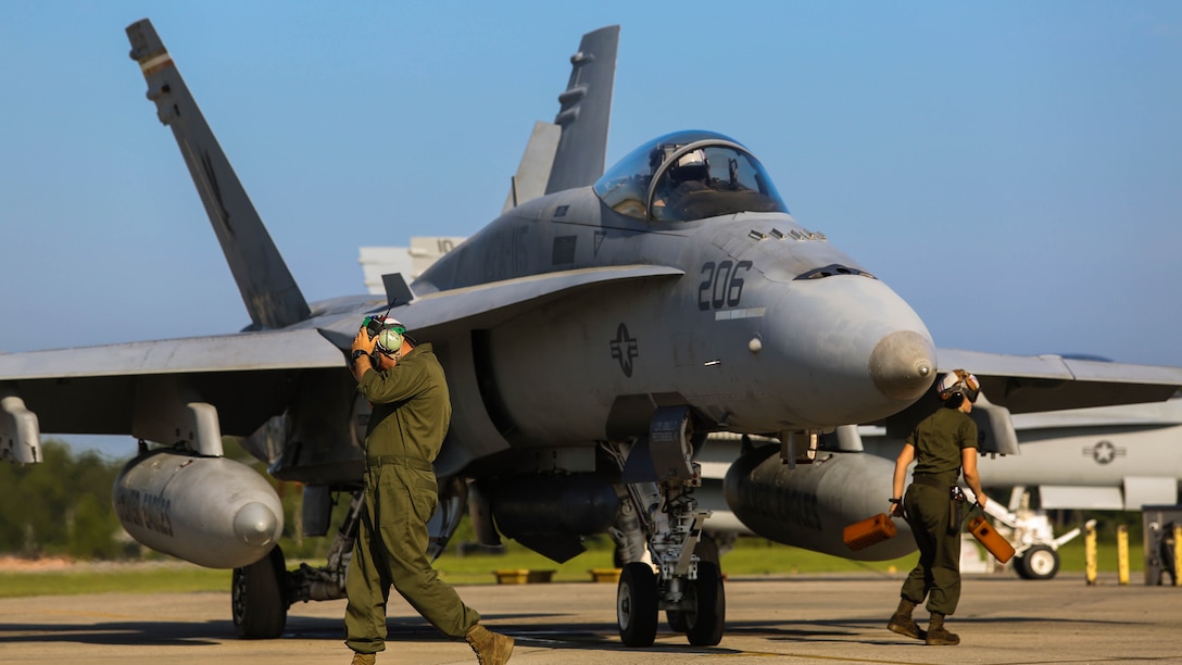 Marines prepare an F/A-18C Hornet to take off from Marine Corps Air Station Beaufort during Exercise Sentry Savannah 2015, Aug. 21. Sentry Savannah is a joint service air operation hosted by the Savannah Combat Readiness Training Center, Ga. The Marines are with Marine Fighter Attack Squadron 115, Marine Aircraft Group 31.