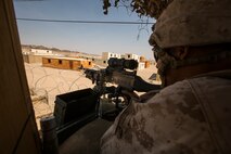 U.S. Marine Corps Cpl. Jose Gonzalez with Company A, 1st Battalion, 7th Marine Regiment, provides perimeter of security while conducting security force operations as a part of Large Scale Exercise (LSE) at Marine Corps Air Ground Combat Center Twentynine Palms, Calif., Aug. 18, 2015. LSE is a joint forces exercise conducted at the brigade level designed to enable live, virtual, and constructive training for participating units and allows participating nations to strengthen partnerships and their ability to operate together. (U.S. Marine Corps photo by Lance Cpl. Clarence A. Leake/Released)
