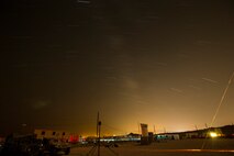 U.S. Marines with Company A, 1st Battalion, 7th Marine Regiment, train throughout the night at a Military Operations Urban Terrain town (MOUT) on range 215 while conducting security force operations as a part of Large Scale Exercise (LSE) at Marine Corps Air Ground Combat Center Twentynine Palms, Calif., Aug. 18, 2015. LSE is a joint forces exercise conducted at the brigade level designed to enable live, virtual, and constructive training for participating units and allows participating nations to strengthen partnerships and their ability to operate together. (U.S. Marine Corps photo by Lance Cpl. Clarence A. Leake/Released)
