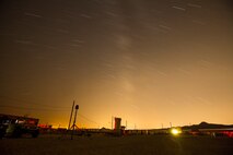U.S. Marines with Company A, 1st Battalion, 7th Marine Regiment, train throughout the night at a Military Operations Urban Terrain town (MOUT) on range 215 while conducting security force operations as a part of Large Scale Exercise (LSE) at Marine Corps Air Ground Combat Center Twentynine Palms, Calif., Aug. 18, 2015. LSE is a joint forces exercise conducted at the brigade level designed to enable live, virtual, and constructive training for participating units and allows participating nations to strengthen partnerships and their ability to operate together. (U.S. Marine Corps photo by Lance Cpl. Clarence A. Leake/Released)