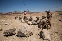 U.S. Marines with Company C, 1st Battalion, 7th Marine Regiment, conduct fire integration support team (FiST) exercise as a part of Large Scale Exercise (LSE) at Marine Corps Air Ground Combat Center Twentynine Palms, Calif., Aug. 16, 2015. LSE is a joint forces exercise conducted at the brigade level designed to enable live, virtual, and constructive training for participating units and allows participating nations to strengthen partnerships and their ability to operate together. (U.S. Marine Corps photo by Lance Cpl. Clarence A. Leake/Released)