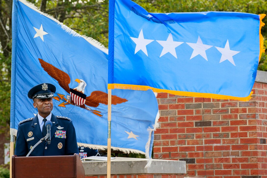 Air Force Gen. Darren W. McDew addresses the audience and troops during the U.S. Transportation Command assumption of command ceremony at Scott Air Force Base, Illinois, Aug. 26, 2015. U.S. Air Force photo by Senior Airman Tristin English