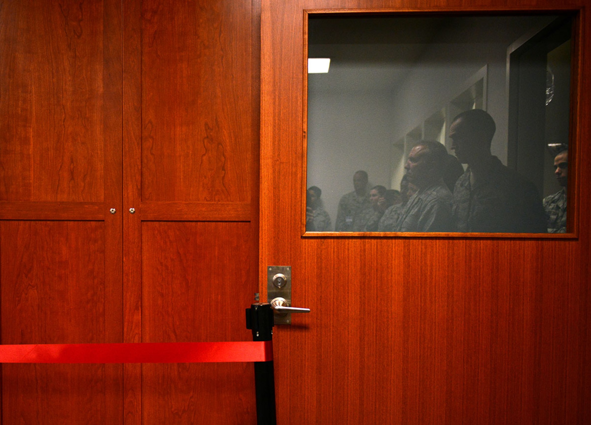 Guests and leadership from all around Joint Base Elmendorf-Richardson, Alaska gather in the new Behavioral Health Unit at the JBER hospital Aug. 25, 2015 for a ribbon-cutting ceremony. The 673d Medical Group's BHU is the first established in PACAF, the unit has been in the planning process since 2009, originally conceived when the JBER hospital was built, and is scheduled to open its doors Sept. 1, 2015. This new facility will facilitate a smooth transition to outpatient treatment and accommodate a seamless continuum of care. (U.S. Air Force photo/ Airman 1st Class Kyle Johnson)
 
