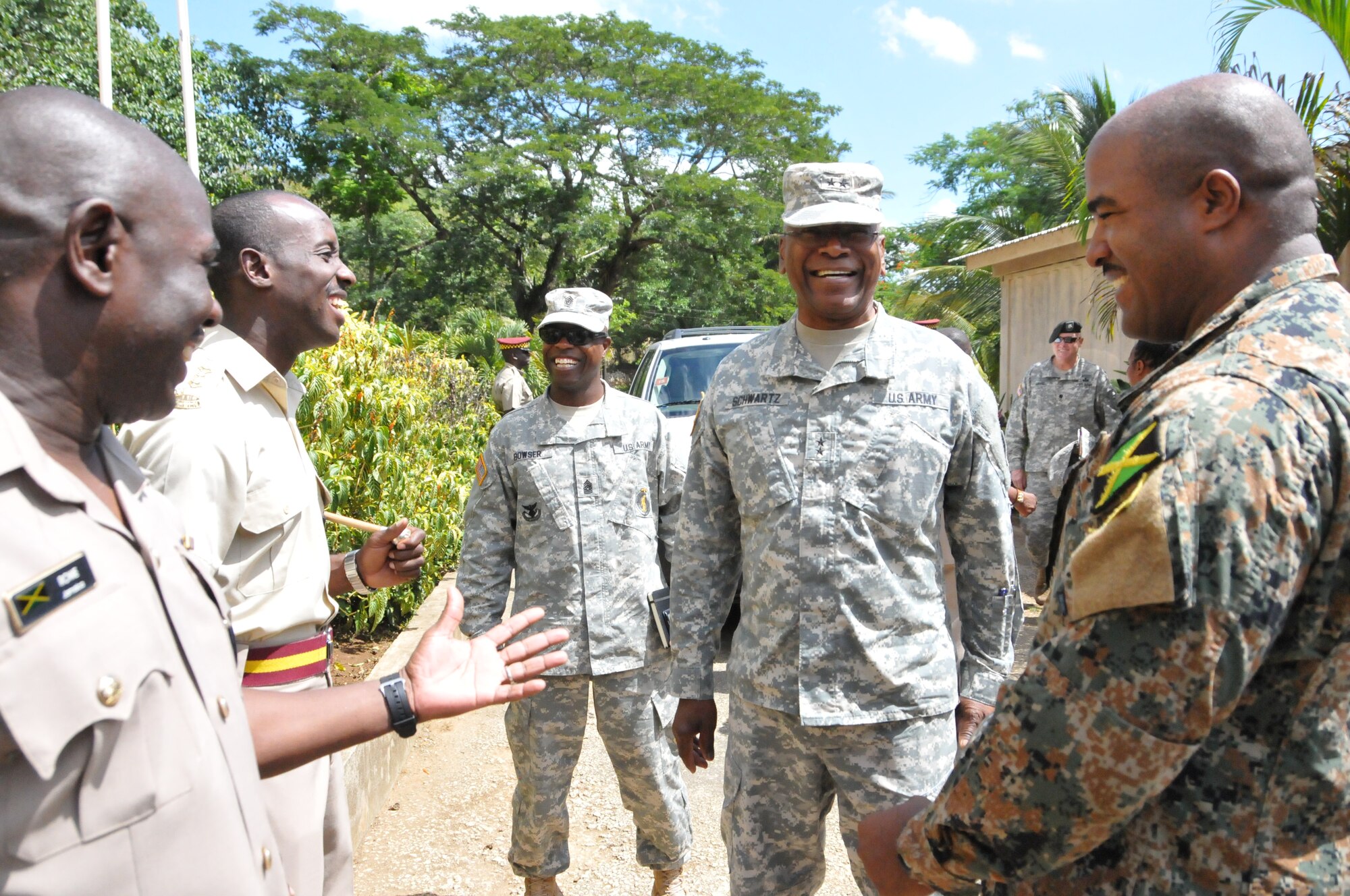 Maj. Gen. Errol Schwartz, Commanding General of the District of Columbia National Guard, speaks with members of the Jamaica Defense Force at the Moneague Training Base, Moneague, Jamaica, Aug. 19. (U.S. Air National Guard photo by Senior Airman Sumeana Leslie)