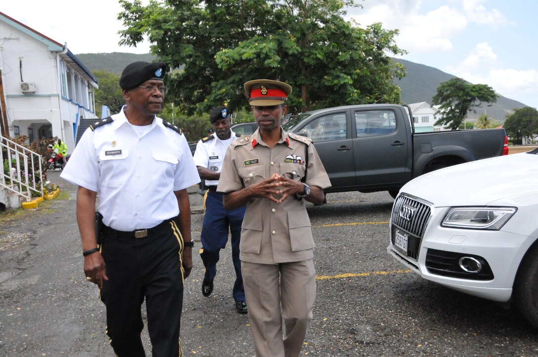 Maj. Gen. Errol Schwartz Commanding General of the District of Columbia National Guard, discusses State Partnership matters with Jamaican Defense Force Deputy Chief of Defense Staff Brigadier Rocky R. Meade, at Up Park Camp in Kingston, Jamaica, Aug. 18. (U.S. Air National Guard photo by Senior Airman Sumeana Leslie)