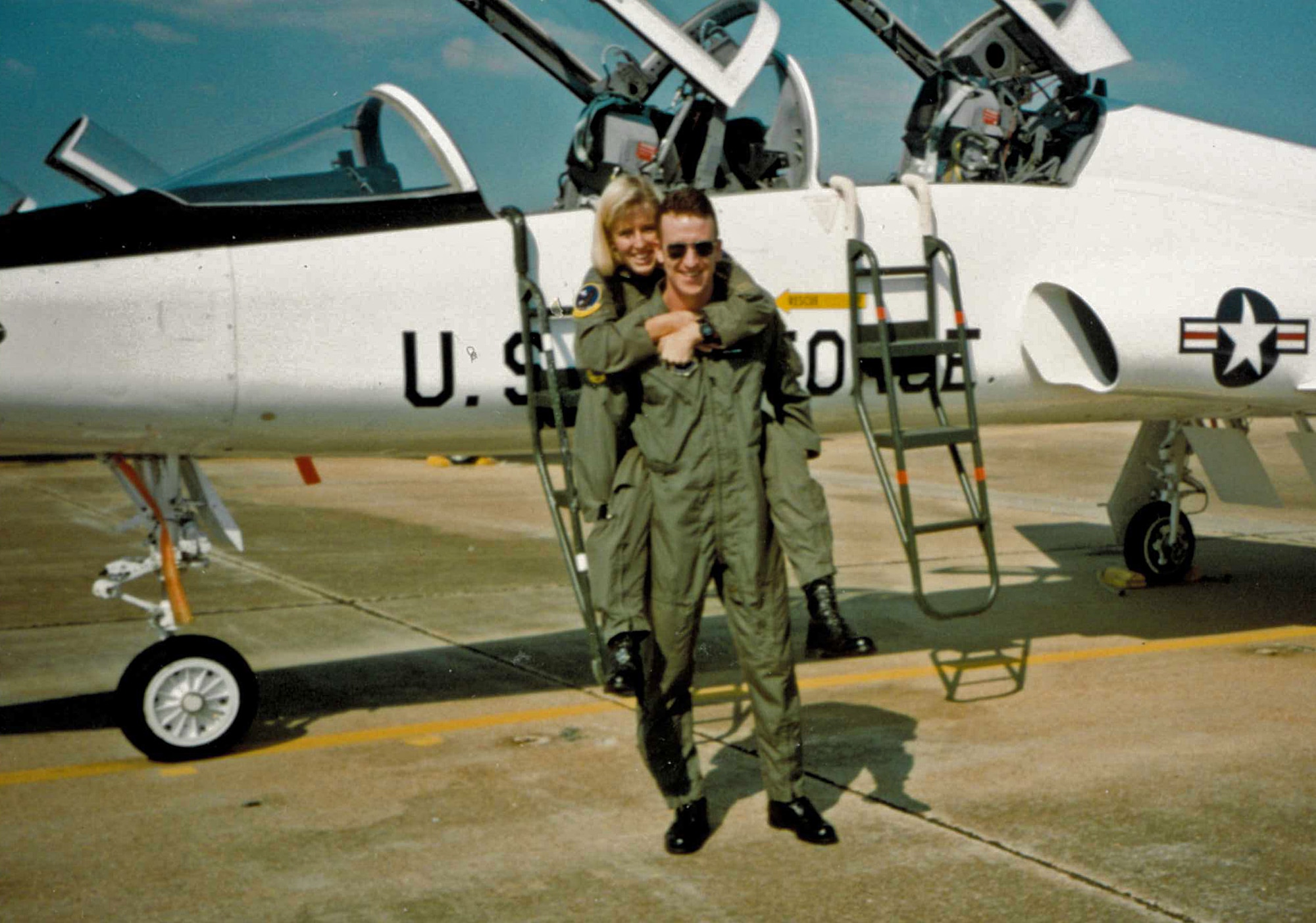 The Lendermans in front of a T-38 aircraft. Col. Laura Lenderman, 375th Air Mobility Wing commander said, “I think one of the main advantages to being a dual military couple is having a mentor who is going through the same things as you are. You have someone who ‘gets it’ right there and who can give you the feedback that you might not get from your peers or subordinates. You need that honest feedback; you need to hear what is not always easy to hear. I’m married to my best friend, and I have my biggest cheerleader and coach right beside me.”