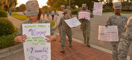 Joint Base Charleston Airmen march together for national Women’s Equality Day at JB Charleston, SC, Aug. 25, 2015. Women’s Equality Day began in 1972, where it was originally called Women’s Rights Day. (U.S. Air Force photo/Airman 1st Class Thomas T. Charlton)