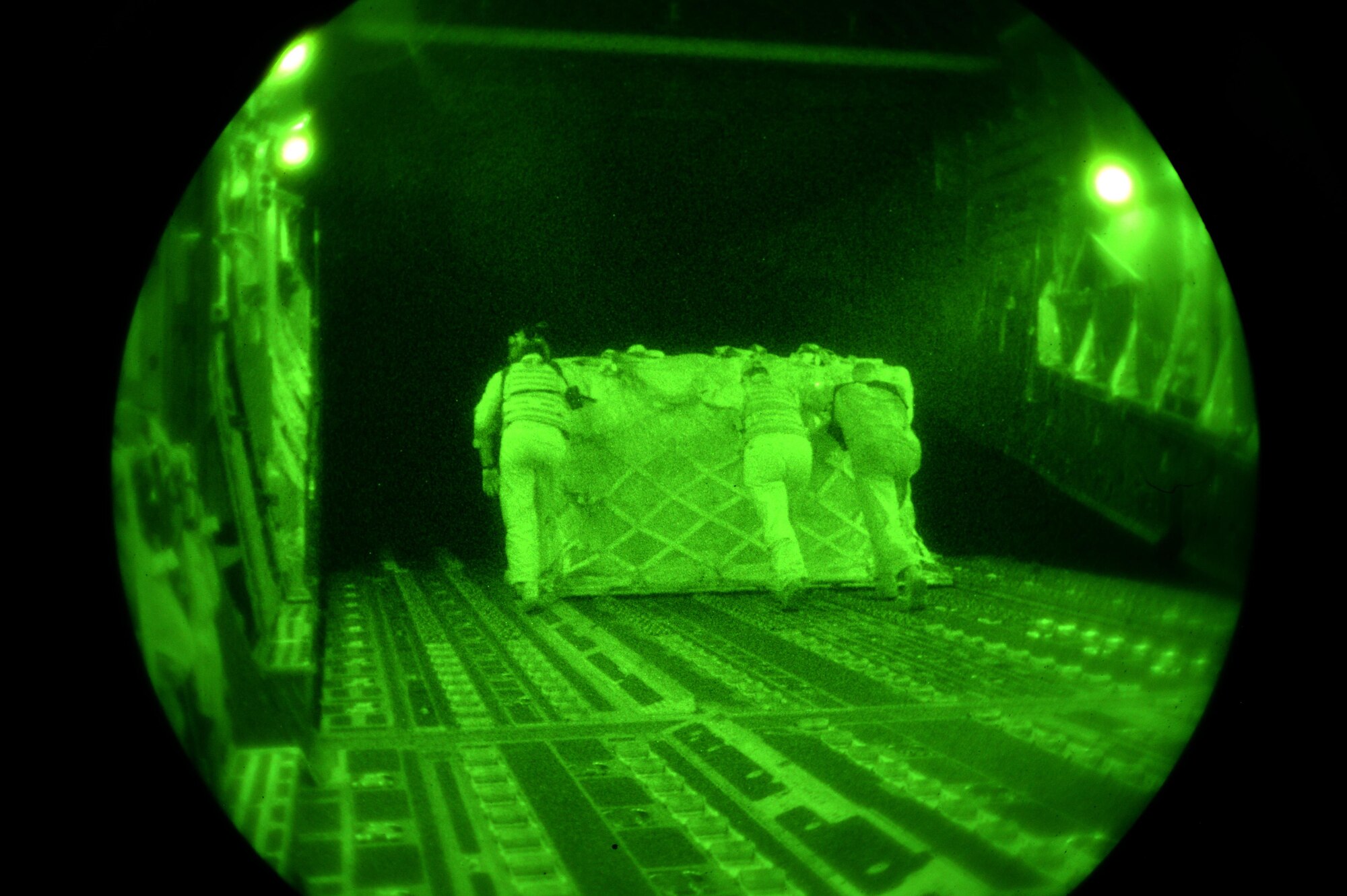 U.S. Air Force members unload cargo from a C-17 Globemaster III in support of Operation Inherent Resolve in Southwest Asia, August 14, 2015. OIR is the military intervention against Daesh. (U.S. Air Force photo by Staff Sgt. Sandra Welch) 