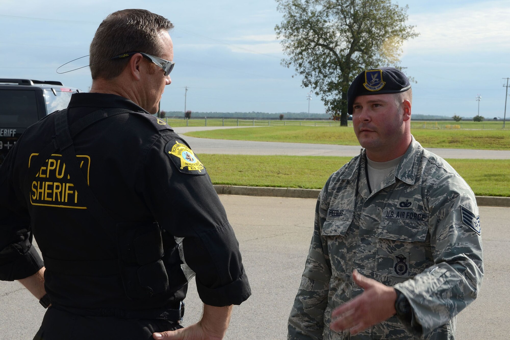 The South Carolina Air National Guard hosted an active shooter exercise combined with the Richland County Sheriff’s Department at McEntire Joint National Guard Base, Eastover, S.C., Aug. 20, 2015. The exercise scenario involved an incident where armed individuals attacked entrance points on base and due to limited personnel on-duty, Richland County responded to assist with K-9, SWAT and explosive ordnance disposal units. Responders tracked the assailants through the woods on base and eventually neutralized the threat. (U.S. Air National Guard photo by Senior Master Sgt. Edward Snyder/RELEASED)