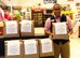 Calvin Teller, the commissary’s customer service ambassador, poses with a brown paper bag filled with non-perishable food items inside the commissary at Holloman Air Force Base on Aug 12. The Feds Feed Families program provides commissary shoppers the opportunity to support local families in need by donating one of these pre-packaged meals costing them $10 or less. (U.S. Air Force photo by Amn Randahl J. Jenson)