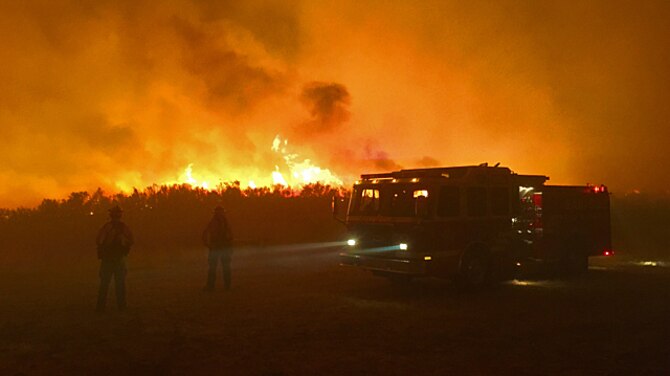 The Okanogan Complex fire burns Aug. 24, 2015 in Washington. Task Force teams staged at Fairchild Air Force Base, Wash., are assisting in firefighting efforts across the state to include the Okanogan Complex fire following the Type 3 Incident Management team’s arrived to the base Aug. 22 to stand up a fire mobilization center. (Courtesy photo)