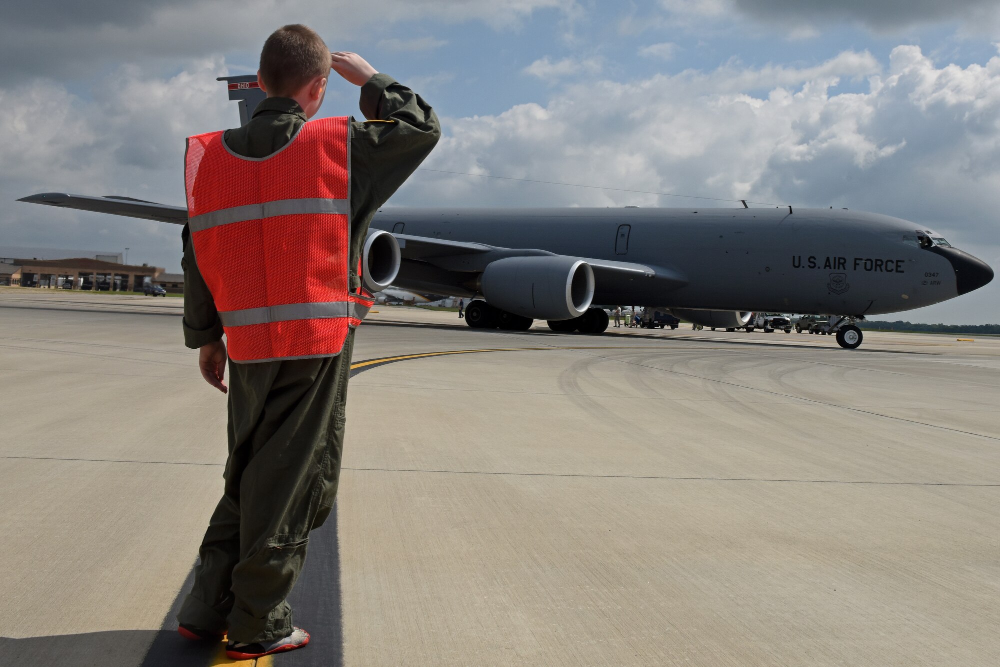 Jake Sprowl, a 12-year-old from Springfield, Ohio, salutes a KC-135R Stratotanker on the flightline, Aug. 11, 2015 at Rickenbacker Air National Guard Base. Sprowl was the honorary Pilot for a Day and spent the day with Airmen of the 121st Air Refueling Wing, touring the base and learning about the missions of the various squadrons. (U.S. Air National Guard photo by Airman Ashley Williams/Released)