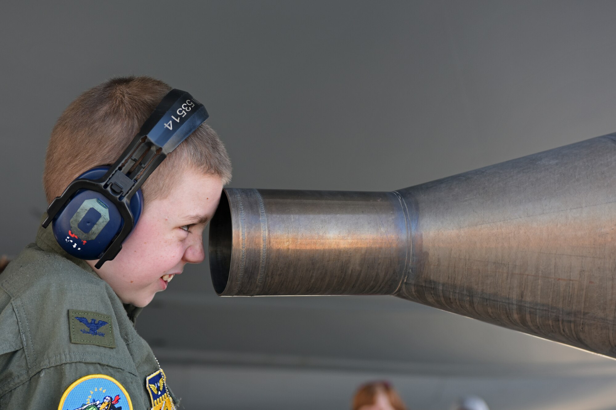 Jake Sprowl, a 12-year-old from Springfield, Ohio, peers into the rear of the engine of a KC-135R Stratotanker Aug. 11, 2015 at Rickenbacker Air National Guard Base. Sprowl was the honorary Pilot for a Day and spent the day with Airmen of the 121st Air Refueling Wing, touring the base and learning about the missions of the various squadrons. (U.S. Air National Guard photo by Airman Ashley Williams/Released)