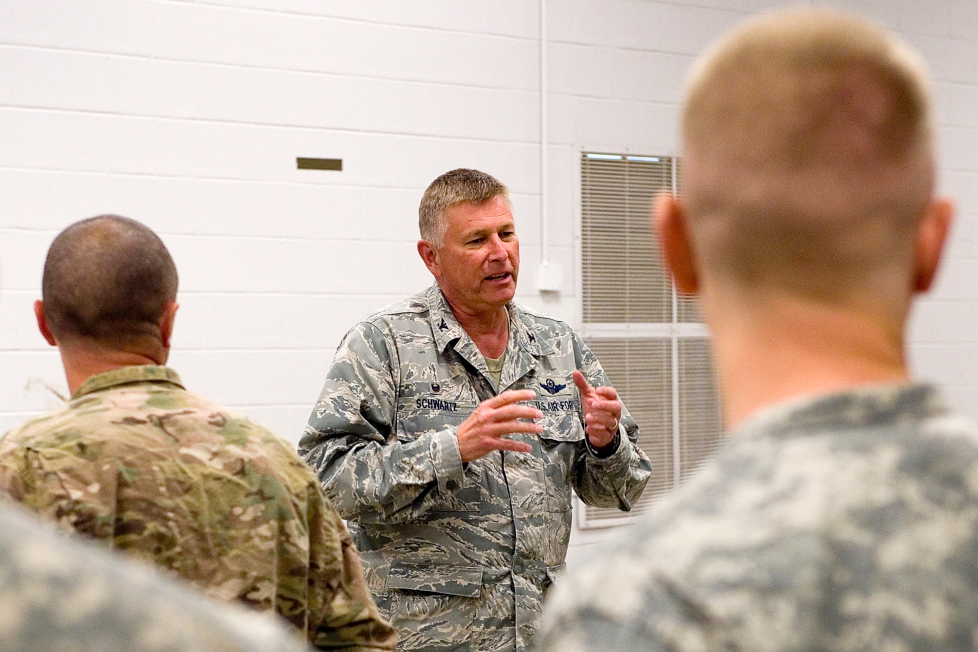 Col. Doug Schwartz, 434th Air Refueling Wing commander talks to soldiers from the 316th Psychological Operations Company during their deployment processing Aug. 24, 2015 at the Army Reserve Center located at Grissom Air Reserve Base, Ind. Soldiers from the 316th PSOP are preparing for a nine-month deployment supporting the Combined Joint Task Force Horn of Africa. (U.S. Air Force photo/Tech. Sgt. Douglas Hays)
