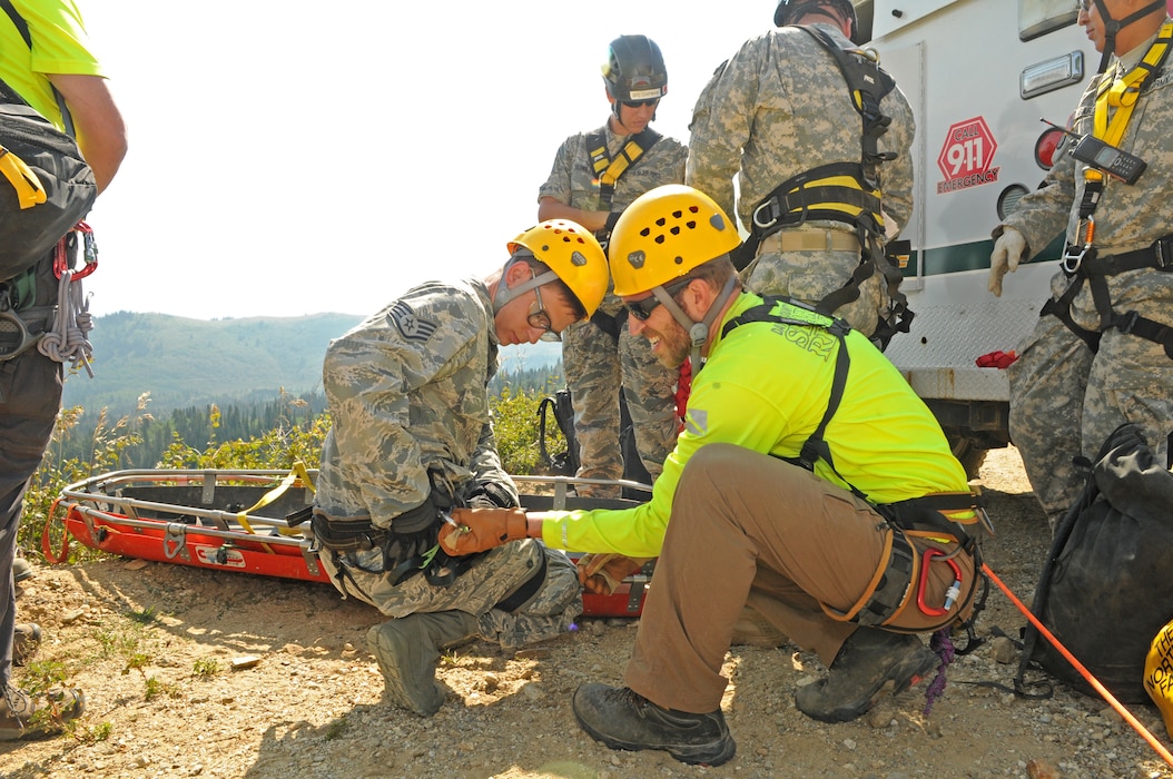 Utah Army and Air National Guard members participate in a multi-agency medevac training scenario with Davis County Search and Rescue near the Beaver Ponds in Utah's Farmington Canyon on Aug. 16, 2015. (U.S. Air National Guard photo by Tech. Sgt. Amber Monio/Released)