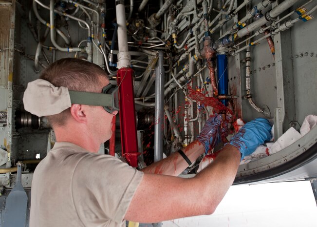 Staff Sgt. David Atteberry, an aircraft hydraulic systems technician assigned to the 92nd Aircraft Maintenance Squadron, Fairchild Air Force Base, Wash., replaces a hydraulic system relief valve on a KC-135 Stratotanker during Red Flag 15-4 at Nellis AFB, Nev., Aug. 25, 2015. Aircraft hydraulic system specialists have knowledge of hydraulic, pneumatic, electrical and mechanical principles applicable to aircraft and support equipment and hydraulic systems. (U.S. Air Force photo by Staff Sgt. Siuta B. Ika)