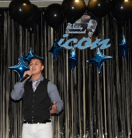 Technical Sgt. Andrew Silvis, 920th Maintenance Squadron took second third place at the base-level AMC Icon competition. Eight Joint Base Charleston members competed in the signing competition held at the Charleston Club, Aug. 20. AMC Icon is loosely based on American Idol where service members, Department of Defense civilians and family members ages 18 and older compete for cash prizes. Silvis performed "Ordinary People" by John Legend. (Courtesy photo / Jessica Donnelly, 628th Force Support Squadron) 