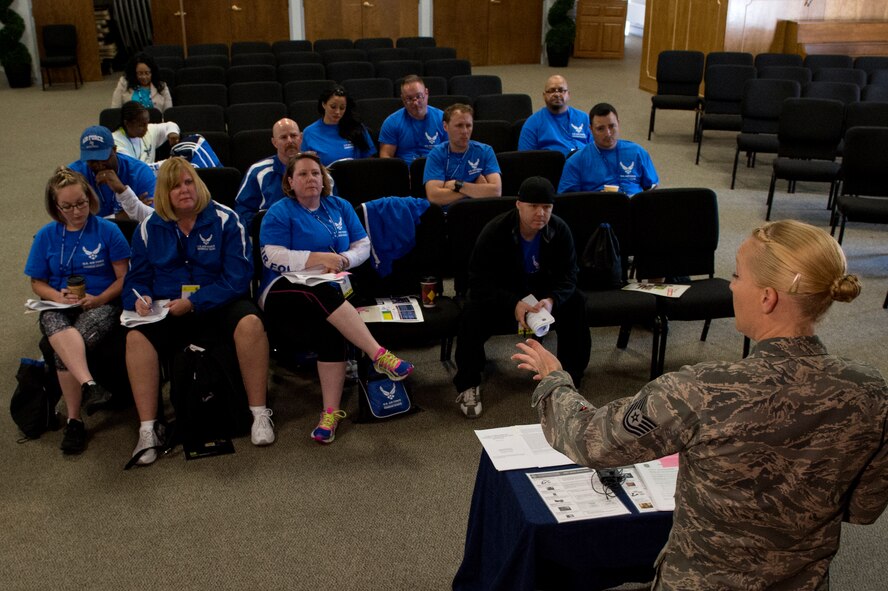 Tech. Sgt. Napola Hansen, Service Member and Family Readiness Center noncommissioned officer, teaches resiliency to wounded warriors during the Air Force Wounded Warrior (AFW2) Program Warrior Care event Aug. 25, 2015, at Joint Base Lewis-McChord, Wash. The Warrior Care event features adaptive and rehabilitative sports activities, career readiness, recovering Airman mentorship and caregiver training. (U.S. Air Force photo by Staff Sgt. Ashley Hyatt)