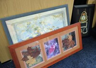 The 100th Force Support Squadron Arts and Crafts Center provides a framing service for customers and has a wide selection of frames and matting to suit most requirements. The facility also takes passport and visa photos for customers, for both tourist and official passports. (U.S. Air Force photo by Karen Abeyasekere/Released)