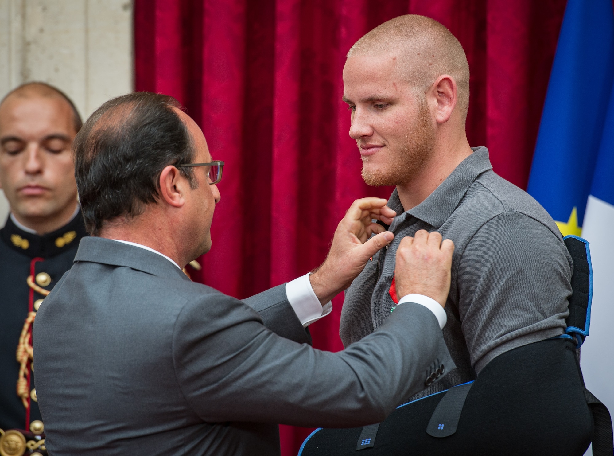 French President Fran??ois Hollande pins the Legion of Honor on U.S. Airman 1st Class Spencer Stone during a ceremony at the ??lys??e in Paris Aug. 24, 2015, following a foiled attack on a French train. Stone was on vacation with his childhood friends, Aleksander Skarlatos and Anthony Sadler, when an armed gunman entered their train carrying an assault rifle, a handgun and a box cutter. The three friends, with the help of a British passenger, subdued the gunman after his rifle jammed. Stone???s medical training prepared him to begin treating wounded passengers while waiting for the authorities to arrive. Stone is an ambulance service technician with the 65th Medical Operations Squadron stationed at Lajes Field, Azores. (U.S. Air Force photo/Tech. Sgt. Ryan Crane)