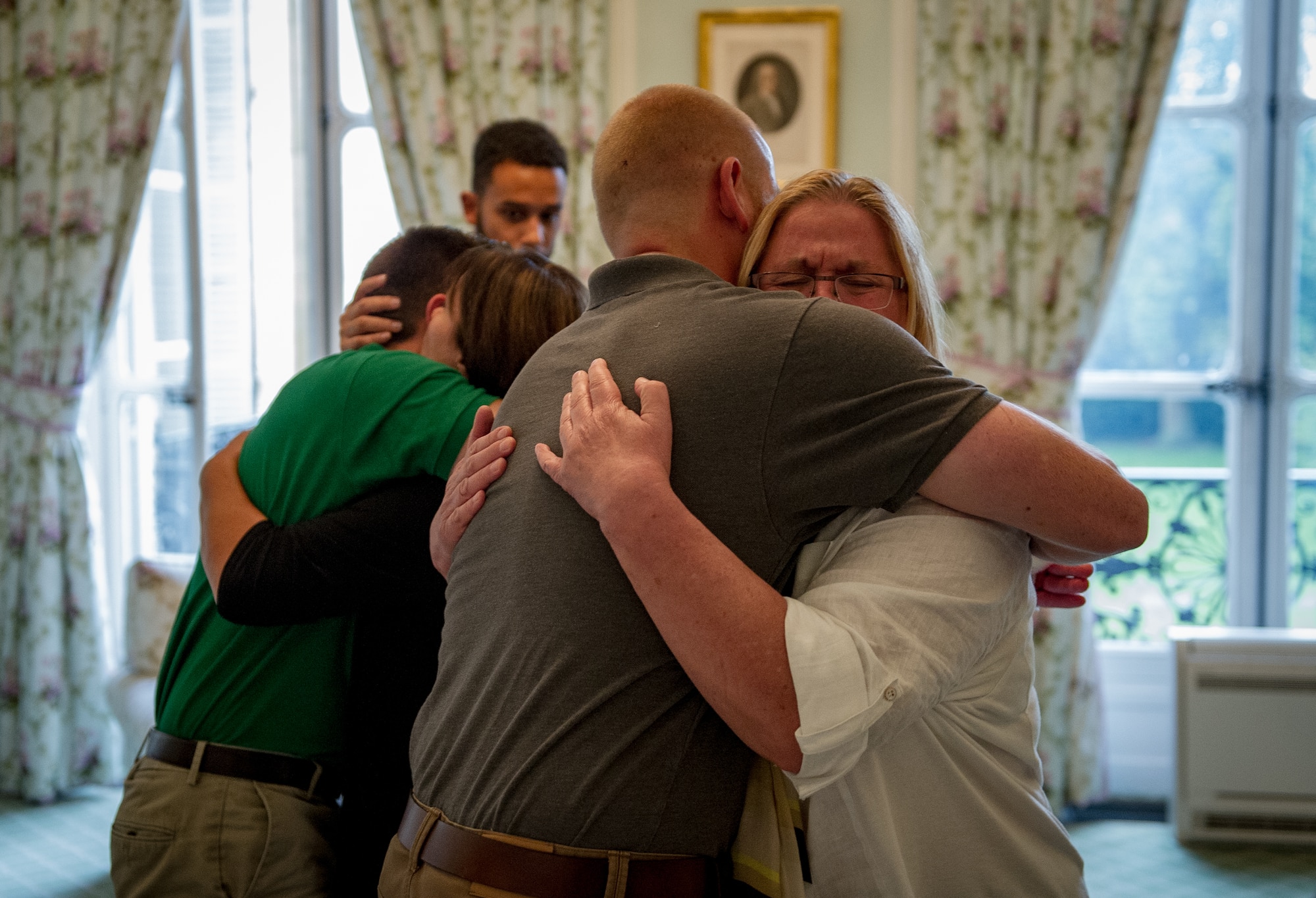 U.S. Airman 1st Class Spencer Stone hugs his mother for the first time in Paris Aug. 24, 2015, following a foiled attack on a French train. Stone was on vacation with his childhood friends, Aleksander Skarlatos and Anthony Sadler, when an armed gunman entered their train carrying an assault rifle, a handgun and a box cutter. The three friends, with the help of a British passenger, subdued the gunman after his rifle jammed. Stone???s medical training prepared him to begin treating wounded passengers while waiting for the authorities to arrive. Stone is an ambulance service technician with the 65th Medical Operations Squadron stationed at Lajes Field, Azores. (U.S. Air Force photo/Tech. Sgt. Ryan Crane)